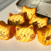 Nyang Nyang Cat Bread Squishy Slow-Rise Stress Toy – Korean kawaii cat toast squishy PU foam assorted faces desk toy gift $10.50