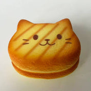 Nyang Nyang Cat Bread Squishy golden brown toast – cute cat faces assorted expressions collectible slow-rise satisfying squeeze stress relief