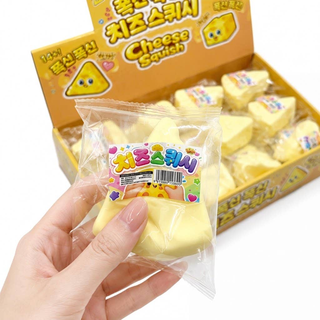 Mini Cheese Squishy held in hand for size