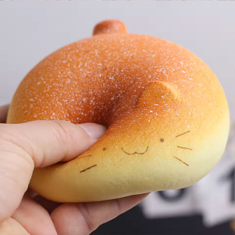 Soft Mochi Cat Squishy held in hand for size