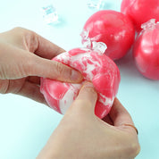 Tomato Crunch Squishy soft glossy pink tomato with tied knot top
